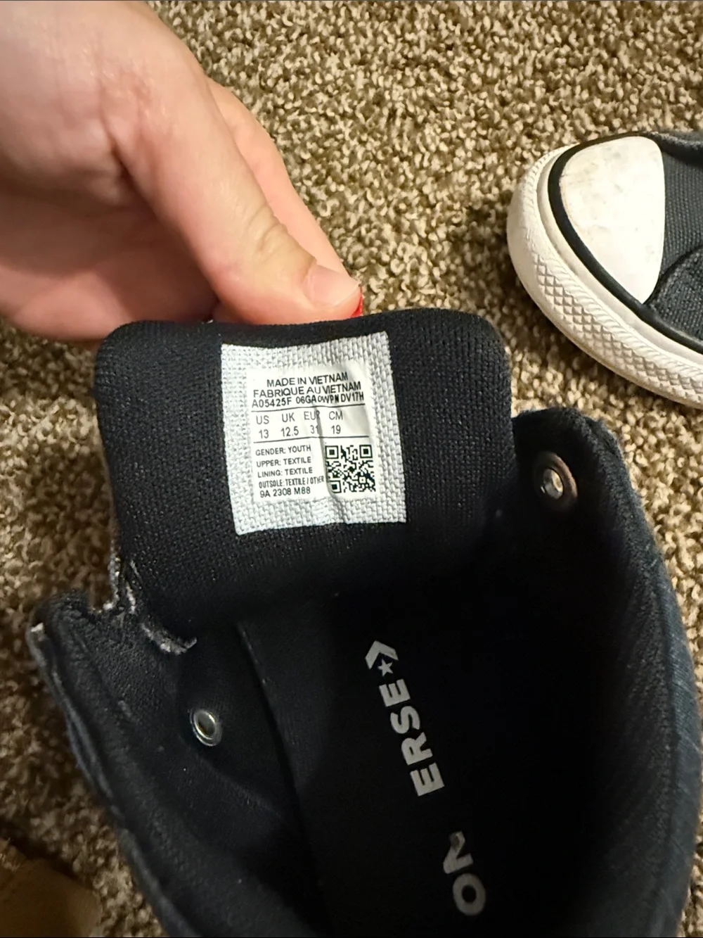 Converse Kids Black Canvas Slip-On Sneakers with Red Heel Loop